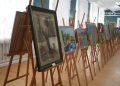 Картины из Петербурга для ДНР: Путин в самолете и летние виды Северной столицы