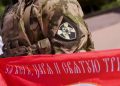 Бойцы СОБР «Восток-Донецк» развернули православное знамя ко Дню Крещения Руси